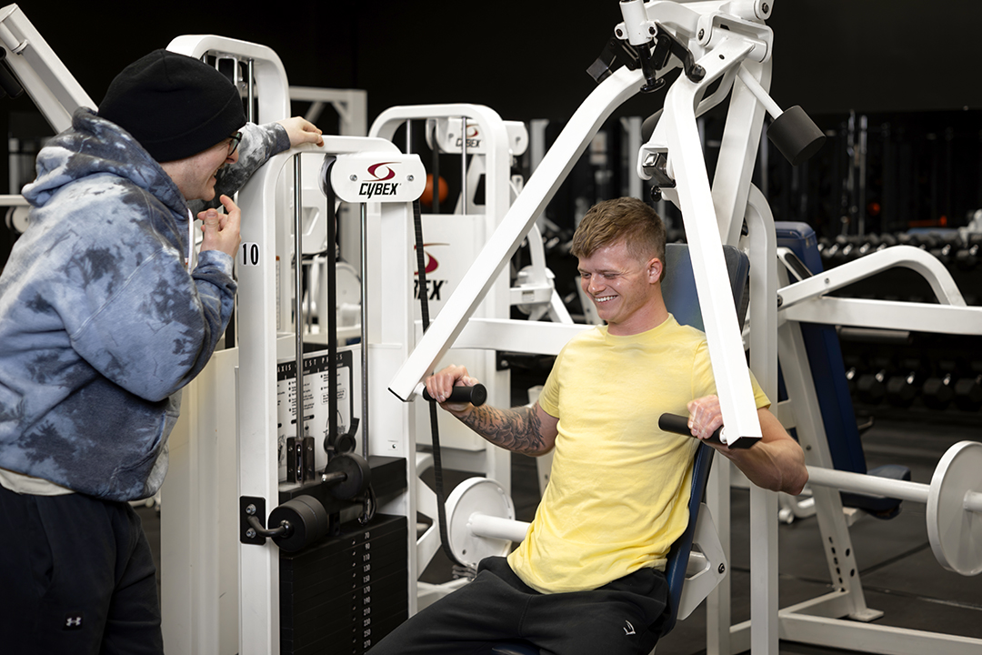 Caden training a client at The Lifting Lab